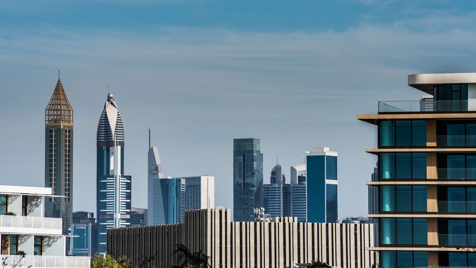 Dubai city skyline beside residential architecture